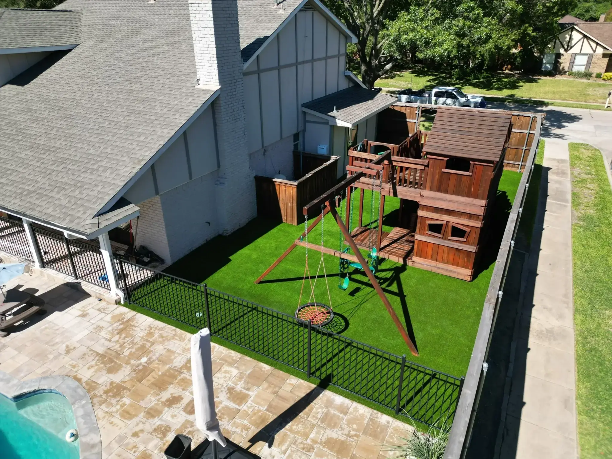 Family backyard turf with play area Georgia